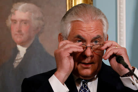 U.S. Secretary of State Rex Tillerson adjusts his glasses as he delivers remarks on the 2016 International Religious Freedom Annual report at the State Department in Washington, U.S. August 15, 2017. REUTERS/Jonathan Ernst