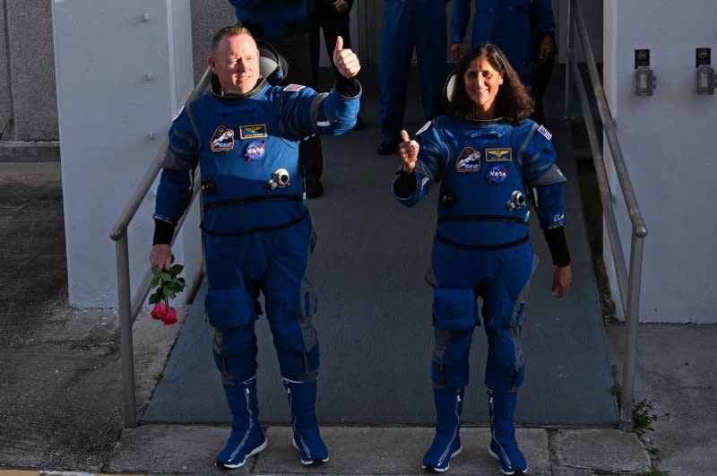 NASA Astronauts Suni Williams (r) and Butch Wilmore walk out from the Operations and Checkout Building at the Kennedy Space Center, Florida on Monday. The two crew members boarded the Boeing Starliner spacecraft on its maiden crewed flight to the International Space Station before the launch was scrubbed over an oxygen relief valve issue. Photo by Joe Marino/UPI