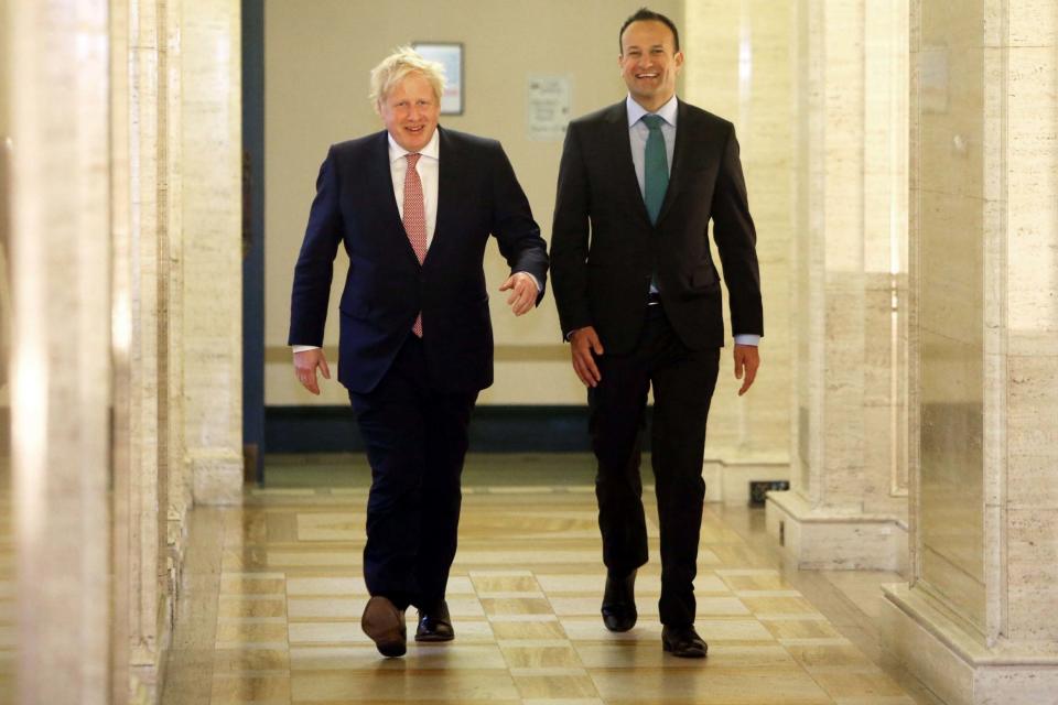 Leo Varadkar and Boris Johnson solve the Irish border issue (IRISH GOVERNMENT/AFP via Getty I)