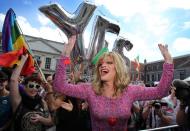 Drag queen and gay rights activist Rory O'Neill, also known as "Panti", celebrates with gay marriage supporters at Dublin Castle on May 23, 2015