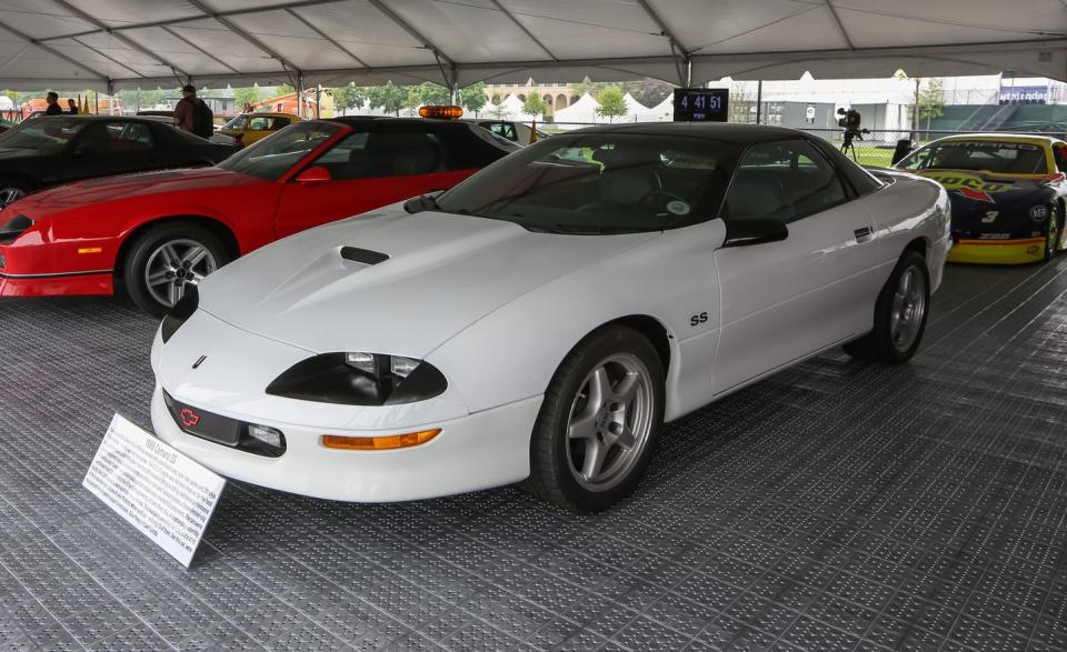 <p>For 1996, Chevy brought back the SS trim level, which for the Camaro meant a sweet hood scoop, a rear spoiler, and Corvette ZR1–mimicking 17-inch wheels. The LT1 V-8 engine made 305 horsepower—a decent bump over the regular Z28's 285 ponies. This example is owned by Carl Linds, and it is one of 73 Arctic White, six-speed manual cars.</p>