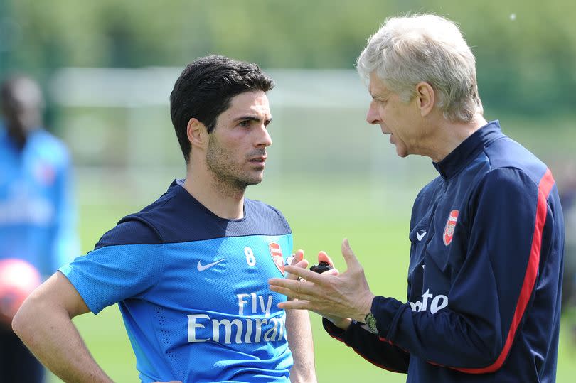 Arsene Wenger and Mikel Arteta