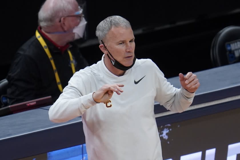 USC coach Andy Enfield watches play against Drake during the second half March 20, 2021.