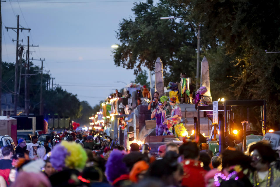 The Krewe of Boo parades in New Orleans Saturday, Oct. 23, 2021. Witches, goblins and masked creatures took to the streets Saturday night in the city’s first large, float parade since the pandemic ended such frivolity. (Scott Threlkeld/The Times-Picayune/The New Orleans Advocate via AP)