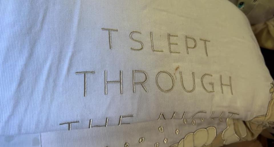 Embroidered typo on Big W Disney baby blanket