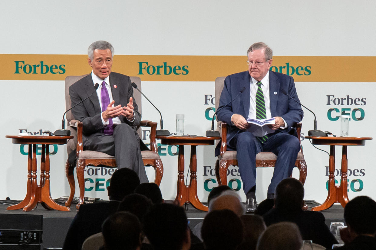 Singapore Prime Minister Lee Hsien Loong (left) in dialogue with Forbes editor-in-chief Steve Forbes at the Forbes Global CEO Conference in Singapore, on Wednesday, 16 October 2019. PHOTO: Dhany Osman/Yahoo News Singapore