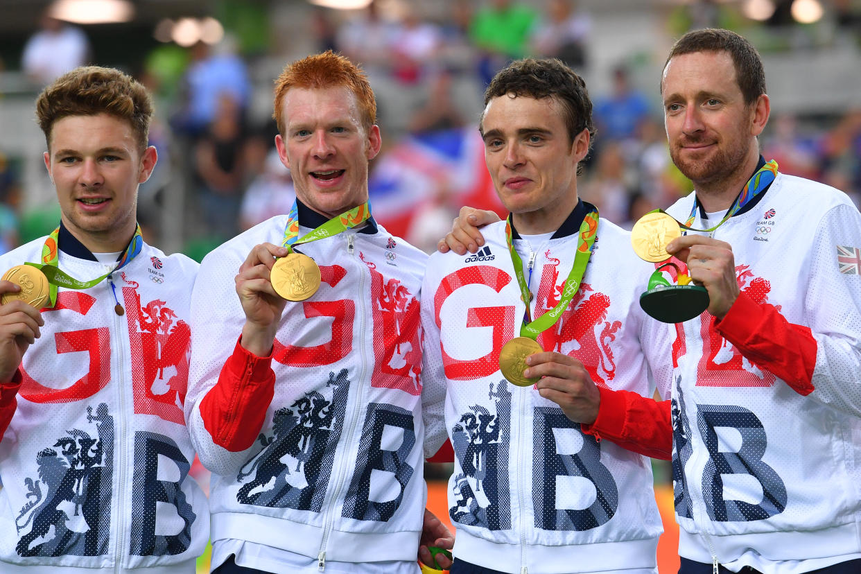 Owen Doull, Ed Clancy, Steven Burke and Bradley Wiggins celebrate winning the Olympic team pursuit title in Rio - Team GB's third straight win in the event.