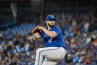 Toronto Blue Jays starting pitcher Alek Manoah winds up during the first inning of the team's baseball game against the Boston Red Sox on Friday, Sept. 30, 2022, in Toronto. (Christopher Katsarov/The Canadian Press via AP)