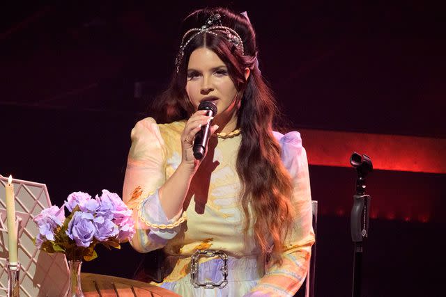 <p>Kristy Sparow/Getty</p> Lana Del Rey performing in Paris in July 2023