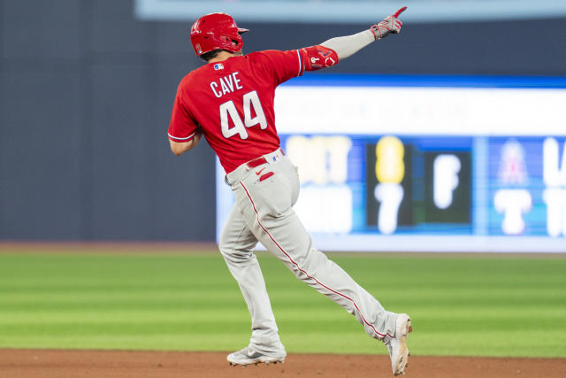 Philadelphia Phillies' Jake Cave hits an RBI sacrifice fly off New