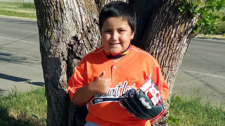 Lori Rosiles says she liked to photograph her children near the same tree at the baseball park.  - Courtesy Lori Rosiles