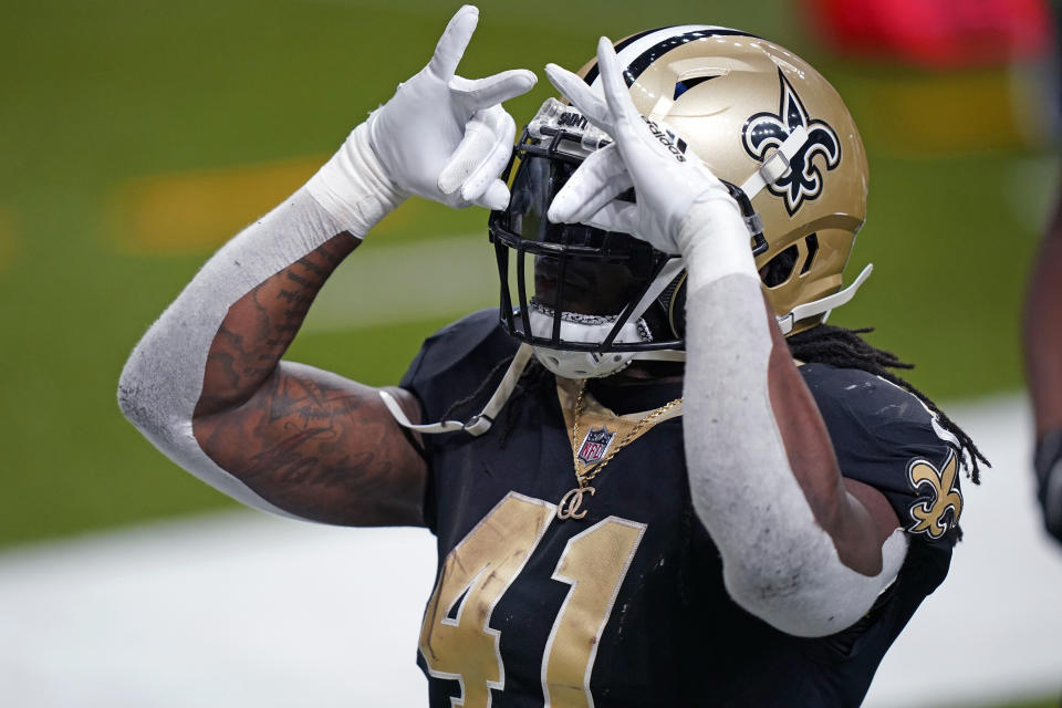 New Orleans Saints running back Alvin Kamara (41) reacts after his touchdown carry in the second half of an NFL football game against the Kansas City Chiefs in New Orleans, Sunday, Dec. 20, 2020. (AP Photo/Butch Dill)