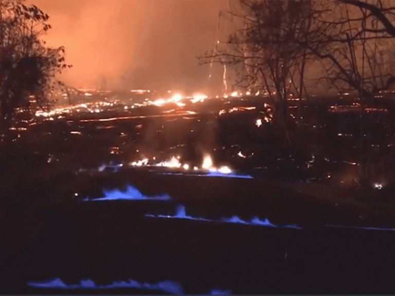 Hawaii volcano latest: Footage shows blue flames bursting through cracks in road after eruption