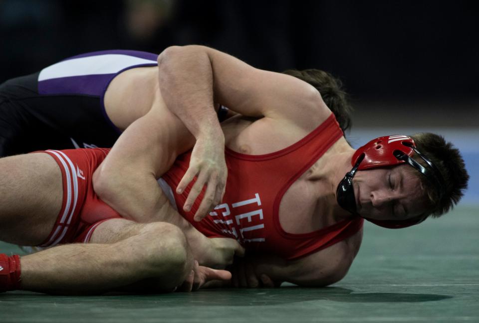 Delaney Ruhlman of Bloomington South wrestles Noah Terry of Tell City in the 170-pound championship match of the 2023 IHSAA Semistate Wrestling tournament at Ford Center in Evansville, Ind., Saturday, Feb. 11, 2023. 