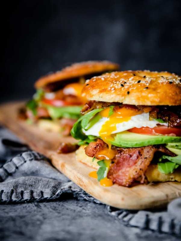 <p>These keto bagel breakfast sandwiches are loaded up with delicious healthy fats. They are piled high with bacon jam, tomato, a perfectly yolky egg, greens and bacon.</p><p><strong>Get the recipe: <a href="https://peaceloveandlowcarb.com/keto-bagel-breakfast-sandwiches/" rel="nofollow noopener" target="_blank" data-ylk="slk:Keto Bagel Breakfast Sandwiches;elm:context_link;itc:0;sec:content-canvas" class="link ">Keto Bagel Breakfast Sandwiches </a></strong></p>