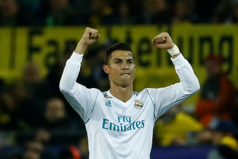 Real Madrid's forward Cristiano Ronaldo celebrates scoring during the UEFA Champions League Group H football match against BVB Borussia Dortmund September 26, 2017