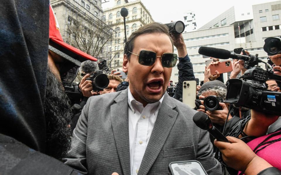 George Santos, the New York Republican congressman, was heckled when he arrived outside the court this morning - Stephanie Keith/Bloomberg