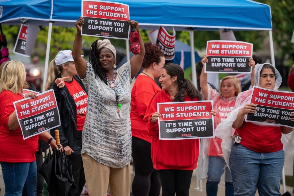 Brockton paraprofessionals held a standout Monday, June 27, 2022, outside the administration building, calling for a fair and livable wage.