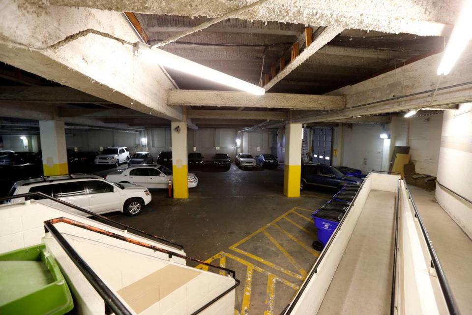 The government center’s parking garage has netting on the ceiling to keep pieces of concrete from falling on cars.