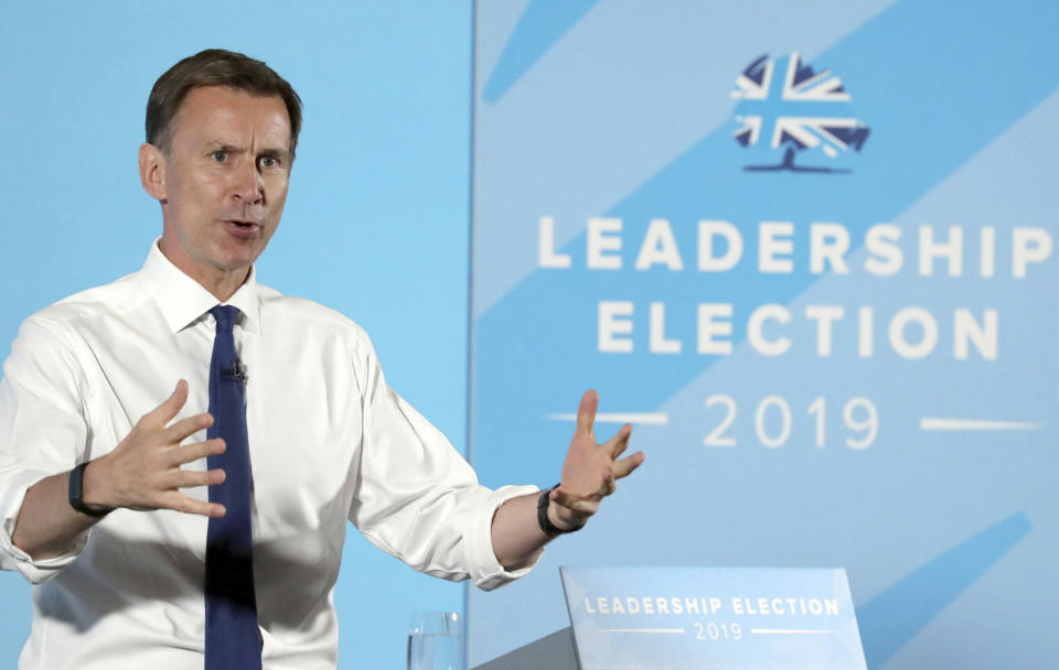 Britain's Conservative Party leadership candidate Jeremy Hunt speaks during a party leadership hustings meeting in Maidstone, southern England, Thursday July 11, 2019. The two contenders, Jeremy Hunt and Boris Johnson are competing for votes from party members, with the winner replacing Prime Minister Theresa May as party leader and Prime Minister of Britain's ruling Conservative Party. (Gareth Fuller/PA via AP)