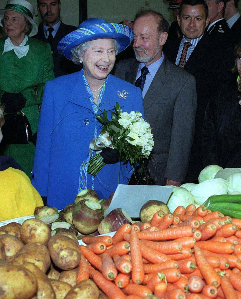 16 Photos of Queen Elizabeth, Prince Charles, and Other Royals at the Grocery Store
