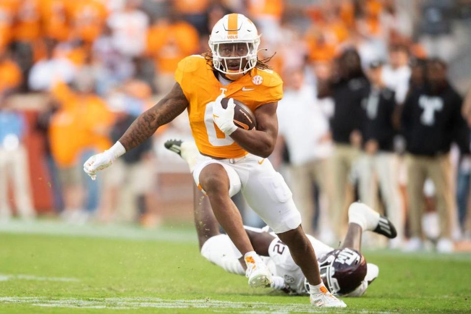 Tennessee running back Jaylen Wright (0) runs the ball during a football game between Tennessee and Texas A&M at Neyland Stadium in Knoxville, Tenn., on Saturday, Oct. 14, 2023.