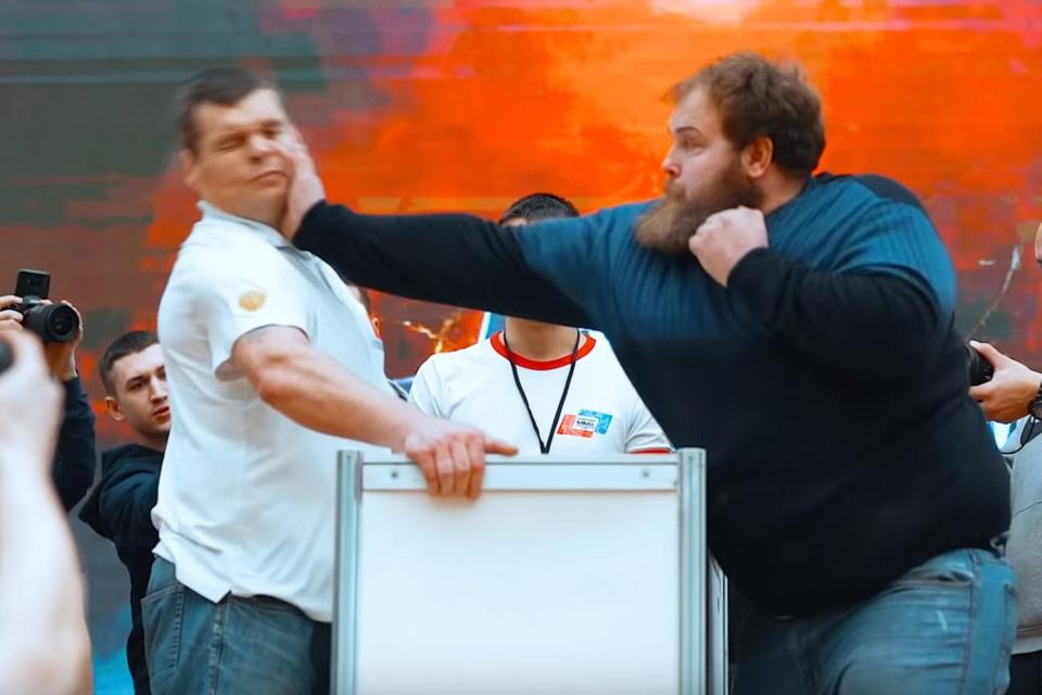 Russian Slapping Championship: Weightlifter wins competition after nearly knocking rival out with one might slap to the face