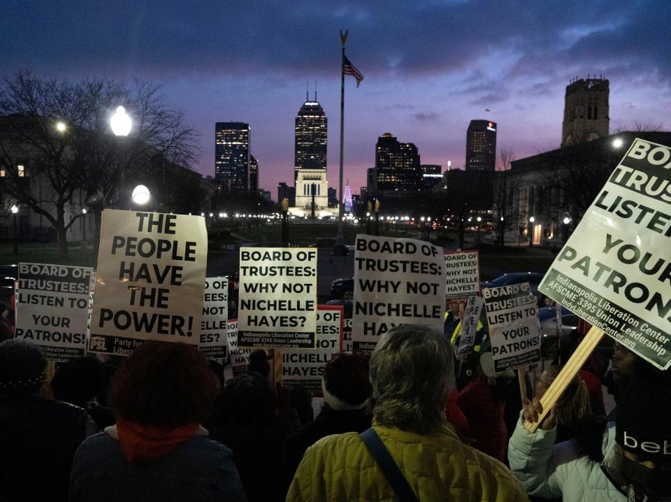 Protesters in support of Nichelle Hayes chant Monday, Dec. 12, 2022, outside the Indianapolis Public Library. 