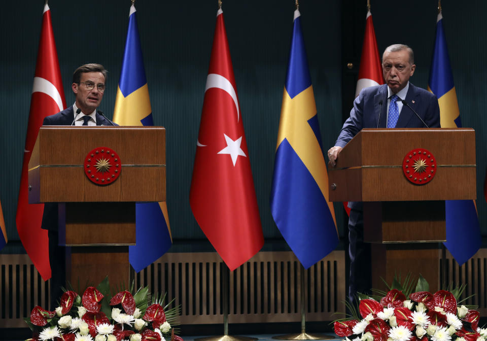 Turkish President Recep Tayyip Erdogan, right, and Sweden's new prime minister, Ulf Kristersson, speak to the media after their talks at the presidential palace in Ankara, Turkey, Tuesday, Nov. 8, 2022. Kristersson met Erdogan on Tuesday in an effort to clinch Turkish approval for his country's bid to join NATO.(AP Photo/Burhan Ozbilici)