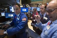 Traders work on the floor of the New York Stock Exchange April 15, 2014. REUTERS/Brendan McDermid