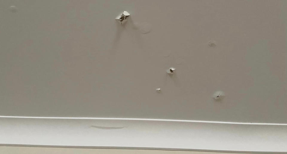 Three holes in the ceiling of the home. 