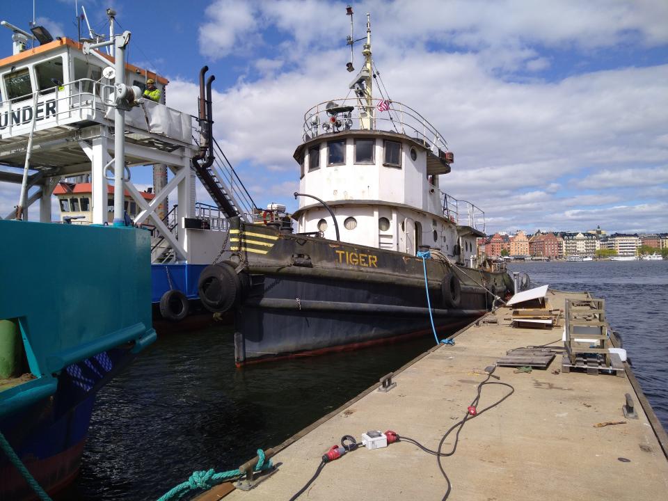 The ST-479 tugboat, also known as Tiger, is currently docked in Stockholm, Sweden, at Mälarvarvet AB, the city's oldest shipyard.