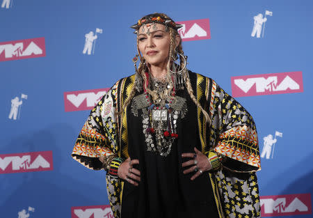 2018 MTV Video Music Awards - Photo Room - Radio City Music Hall, New York, U.S., August 20, 2018. - Madonna poses backstage. REUTERS/Carlo Allegri
