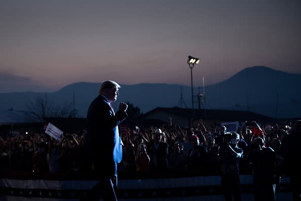 US President Donald Trump arrives to speak at a campaign rally at the Minden-Tahoe airport in Minden, Nevada.