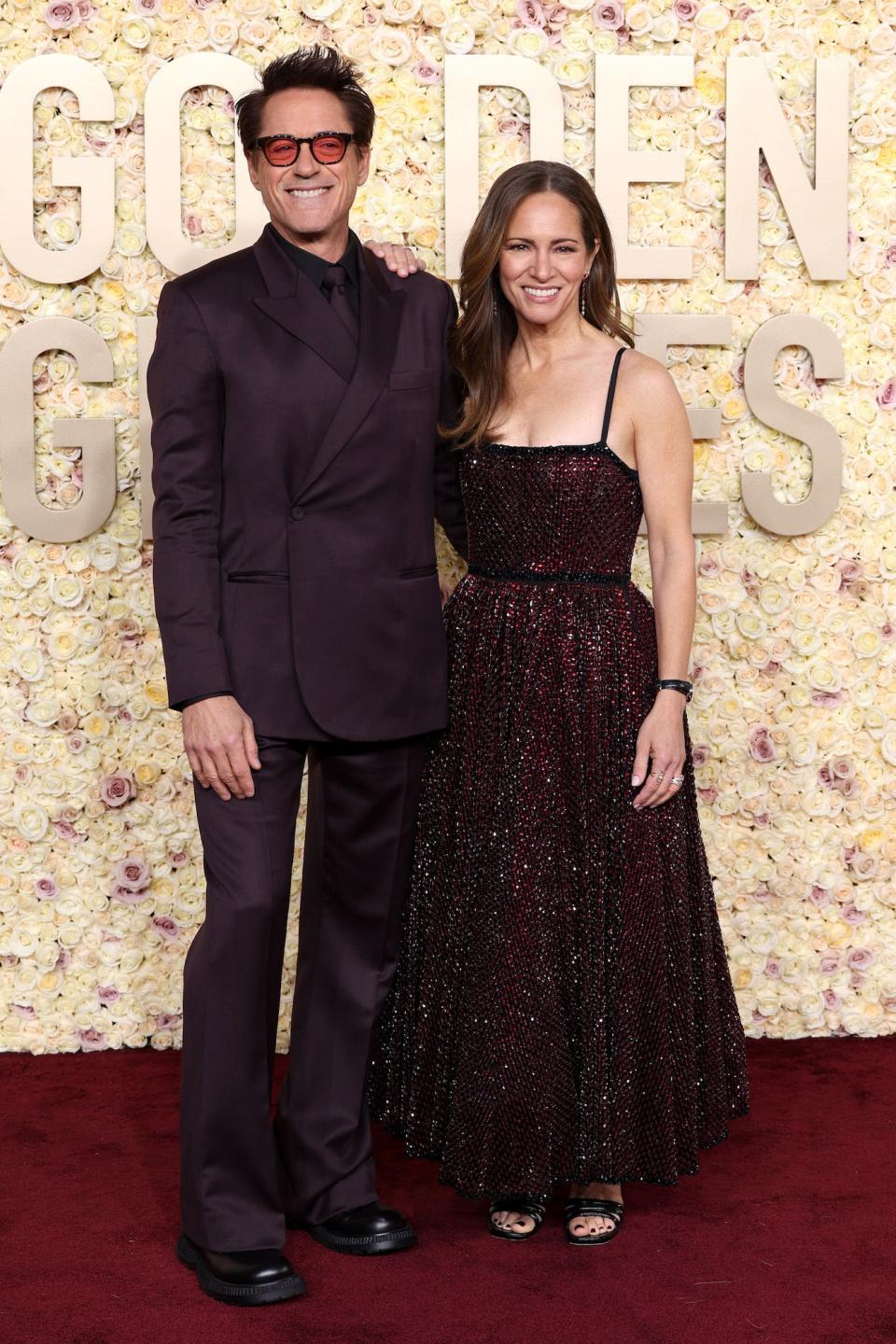 Robert Downey Jr. and Susan Downey attend the 2024 Golden Globes.
