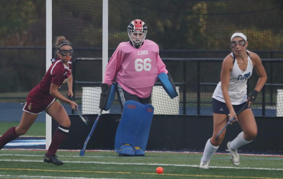 John Jay goalkeeper Cat Morgan tracks the ball during an Oct. 2, 2019 field hockey game against Arlington.