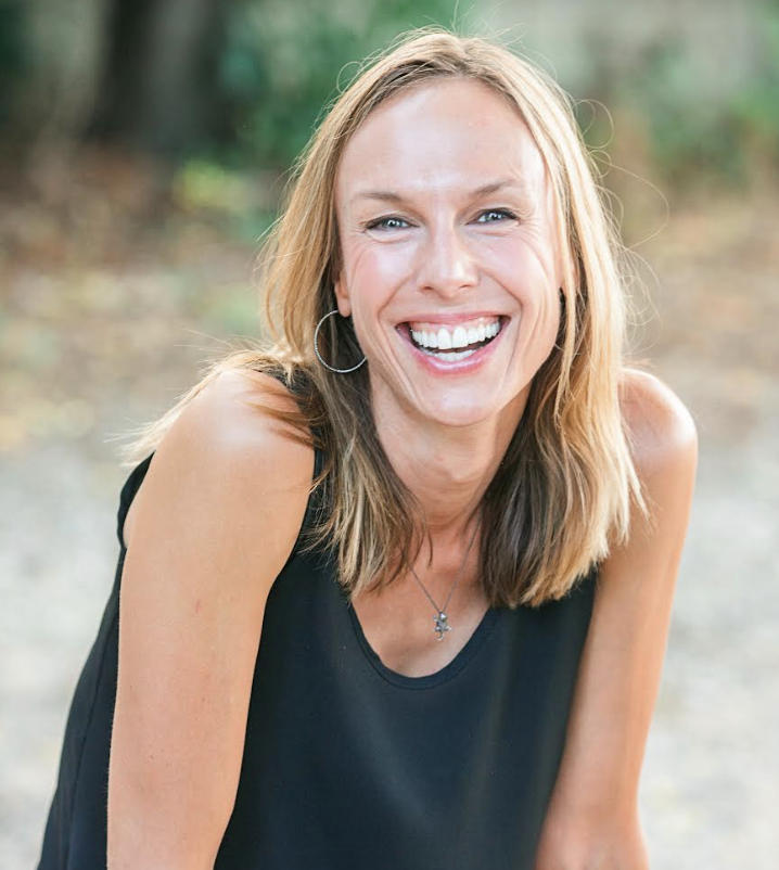 A headshot of author Sarah E. Hill