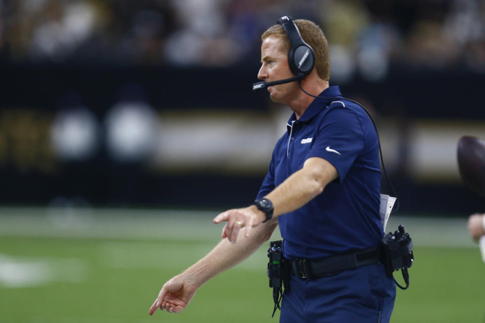 Dallas Cowboys head coach Jason Garrett calls out from the sideline in the first half of an NFL football game against the New Orleans Saints in New Orleans, Sunday, Sept. 29, 2019. (AP Photo/Butch Dill)