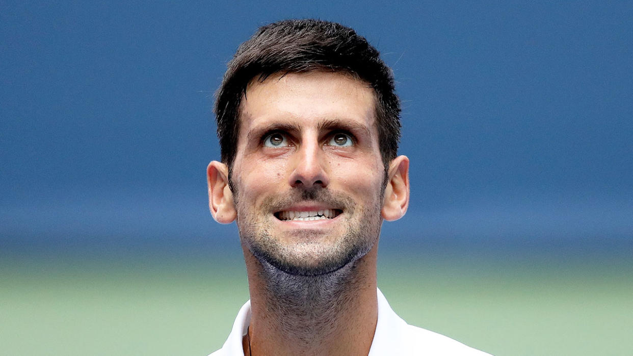 Novak Djokovic is seen here grimacing during a tennis match.