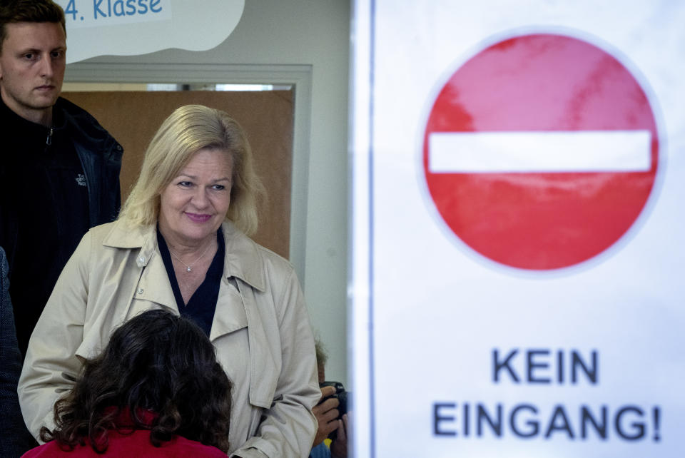 German Interior Minister and top candidate of the Social Democratic Party Nancy Faeser casts her vote for the Hesse federal state election in Schwalbach near Frankfurt, Germany, Sunday, Oct. 8, 2023. (AP Photo/Michael Probst)