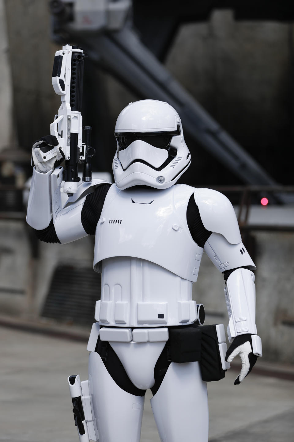 A storm trooper makes his way in the Star Wars themed land, Galaxy's Edge during a preview at Hollywood Studios at Disney World, Tuesday, Aug. 27, 2019, in Lake Buena Vista, Fla. The attraction will open Thursday to park guests. (AP Photo/John Raoux)