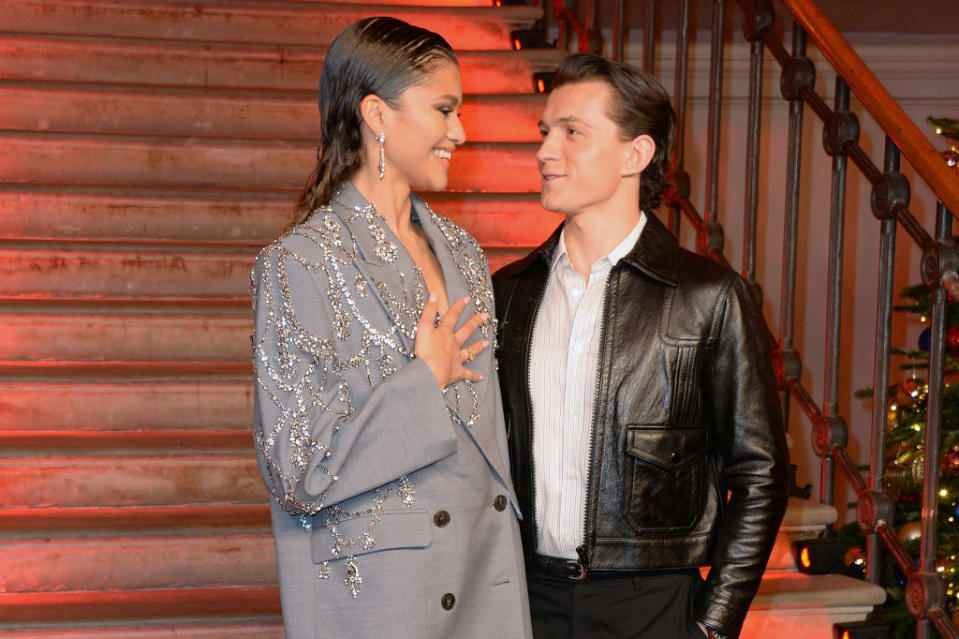 Zendaya and Tom gazing at each other at the "Spider-Man: No Way Home" photo-call in London