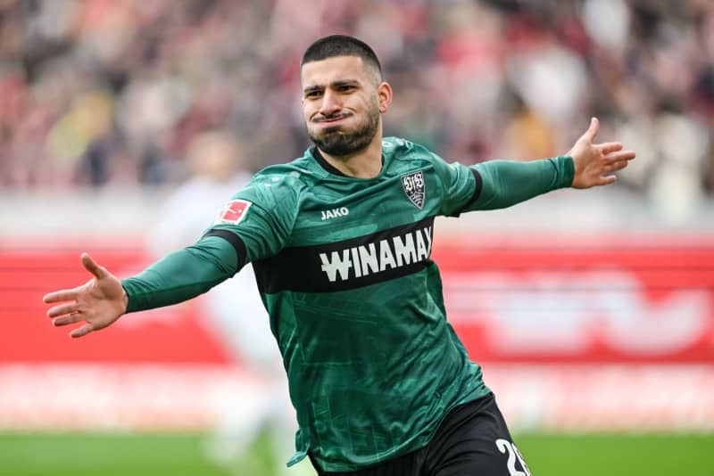 Stuttgart's Deniz Undav (R) celebrates scoring his side's first goal during the German Bundesliga soccer match between SC Freiburg and VfB Stuttgart at the Europa-Park Stadium. Harry Langer/dpa