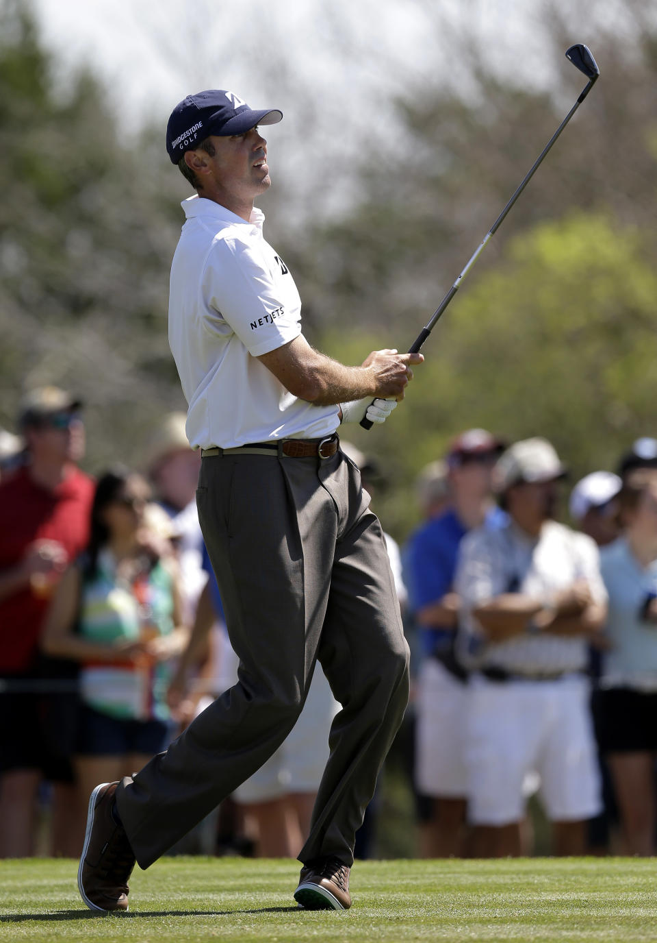 Matt Kuchar watches his tee shot on the third hole during the final round of the Texas Open golf tournament on Sunday, March 30, 2014, in San Antonio. (AP Photo/Eric Gay)