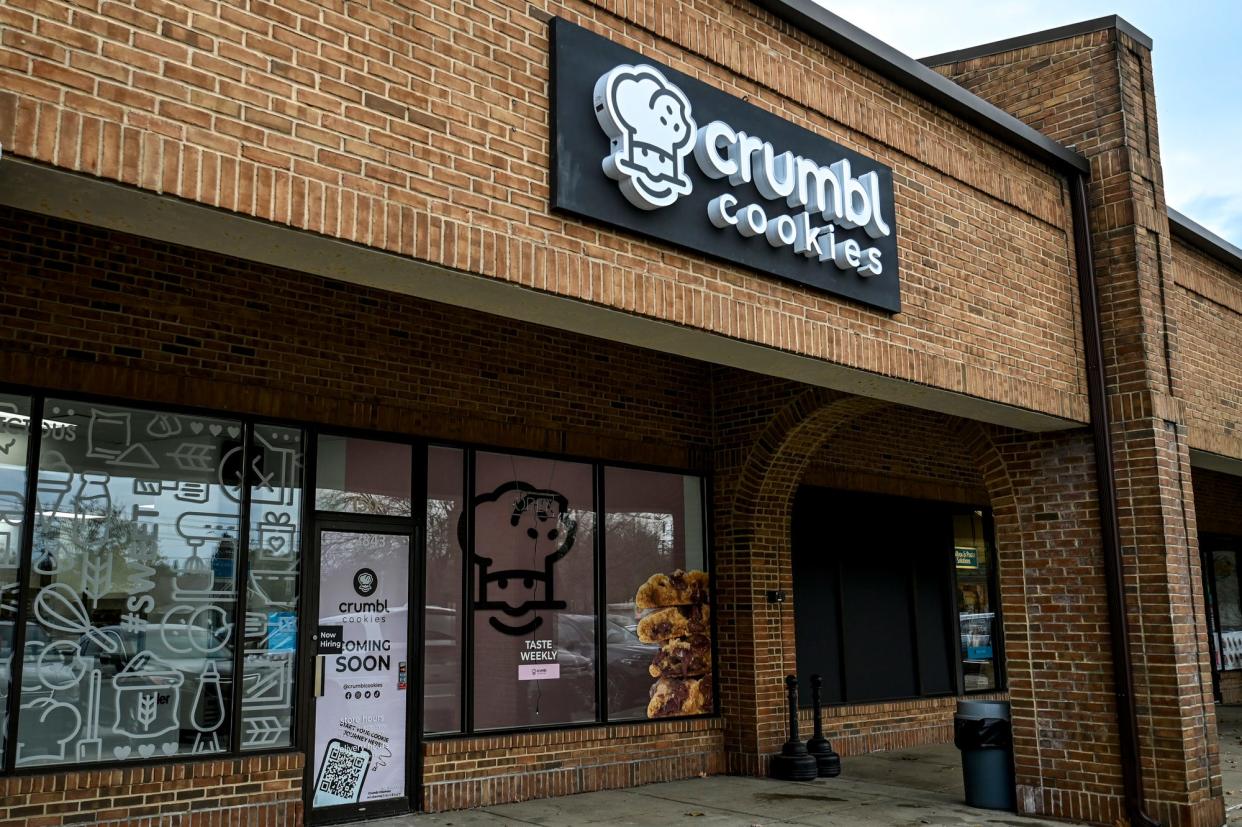 The sign outside the Crumbl Cookies location on Grand River Avenue on Monday, Nov. 6, 2023, in East Lansing.