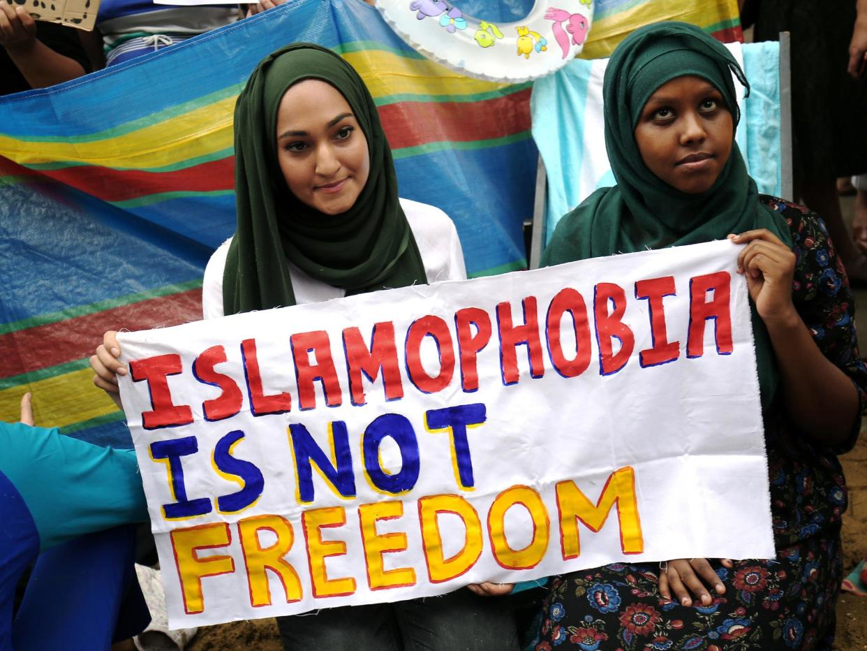 Protesters demonstrate against France's ban of the burkini, outside the French Embassy in London: REUTERS