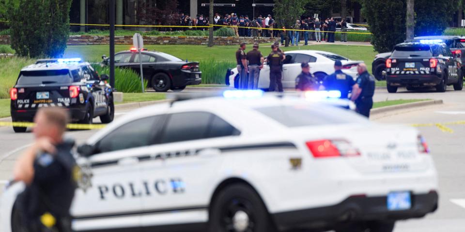 Emergency personnel work at the scene of a shooting at the Saint Francis hospital campus, in Tulsa, Oklahoma, June 1, 2022.