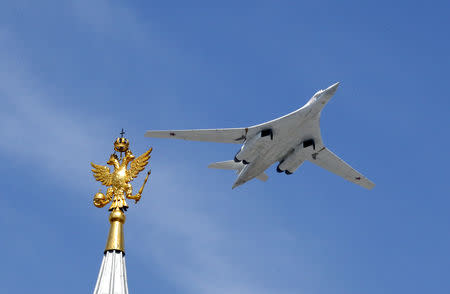 FILE PHOTO - A Tu-160 heavy strategic bomber flies during the Victory Day parade above Red Square in Moscow, Russia, May 9, 2015. REUTERS/Grigory Dukor