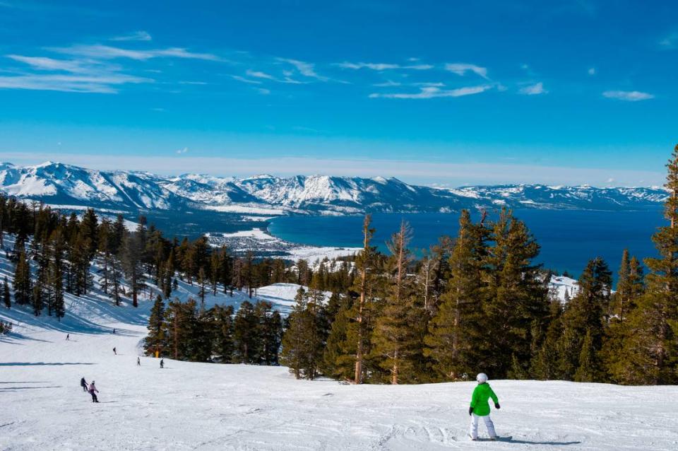 A snowboarder pauses to take in the views of Lake Tahoe from Heavenly Mountain Resort in February.