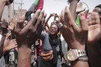 Sudanese anti-military protesters march in demonstrations in the capital of Sudan, Khartoum, on Thursday, June 30, 2022. A Sudanese medical group says at least seven people were killed on Thursday in the anti-coup rallies during which security forces fired on protesters denouncing the country’s military rulers and demanding an immediate transfer of power to civilians. (AP Photo/Marwan Ali)